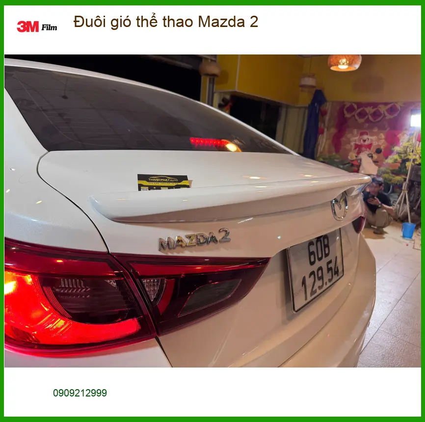 Chú Minh độ đuôi gió thể thao cho Mazda 2 tại Quận Bình Tân để xe trông thể thao hơn