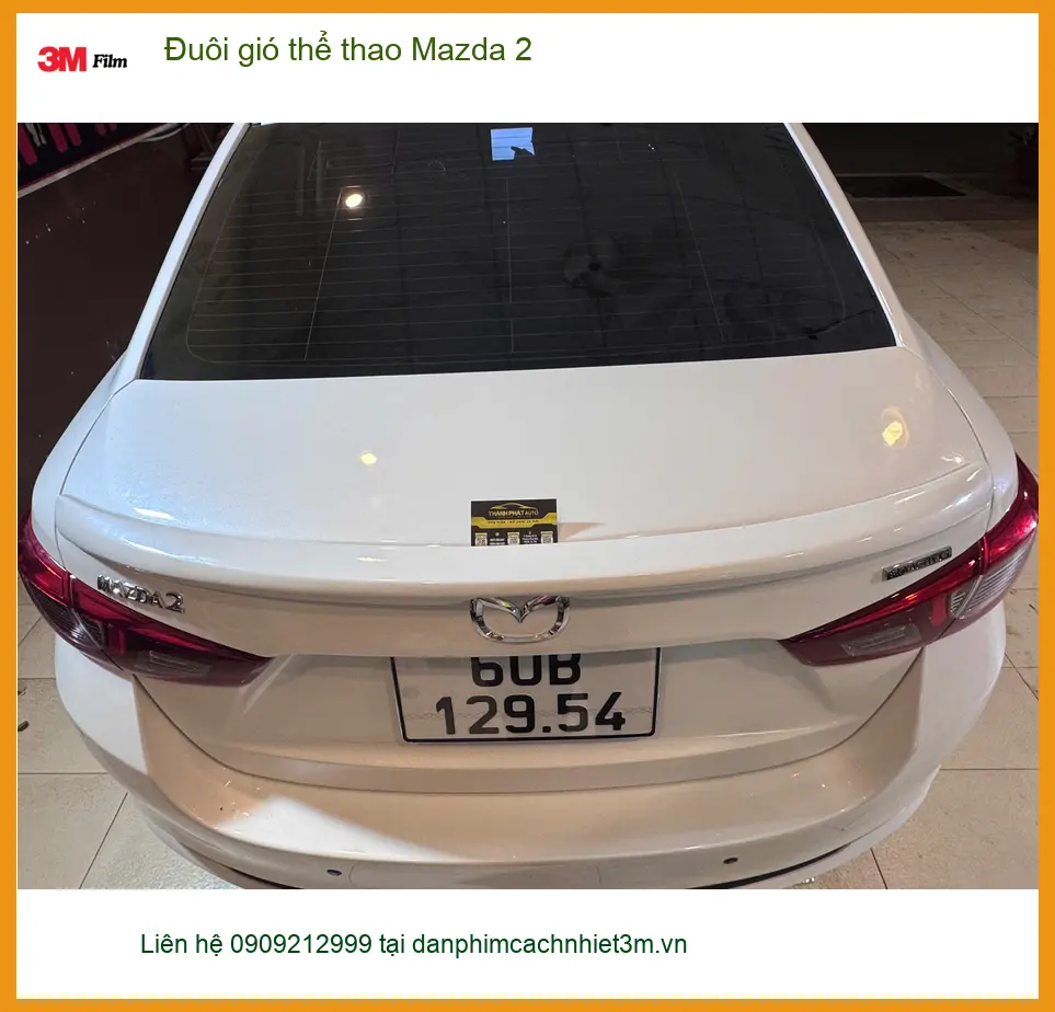 Chú Minh độ đuôi gió thể thao cho Mazda 2 tại Quận Bình Tân để xe trông thể thao hơn ảnh thực tế 4