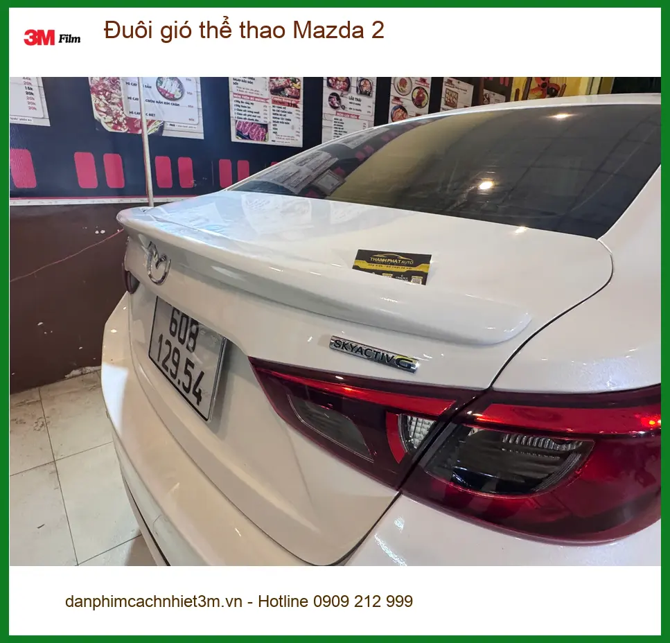 Chú Minh độ đuôi gió thể thao cho Mazda 2 tại Quận Bình Tân để xe trông thể thao hơn ảnh thực tế 5