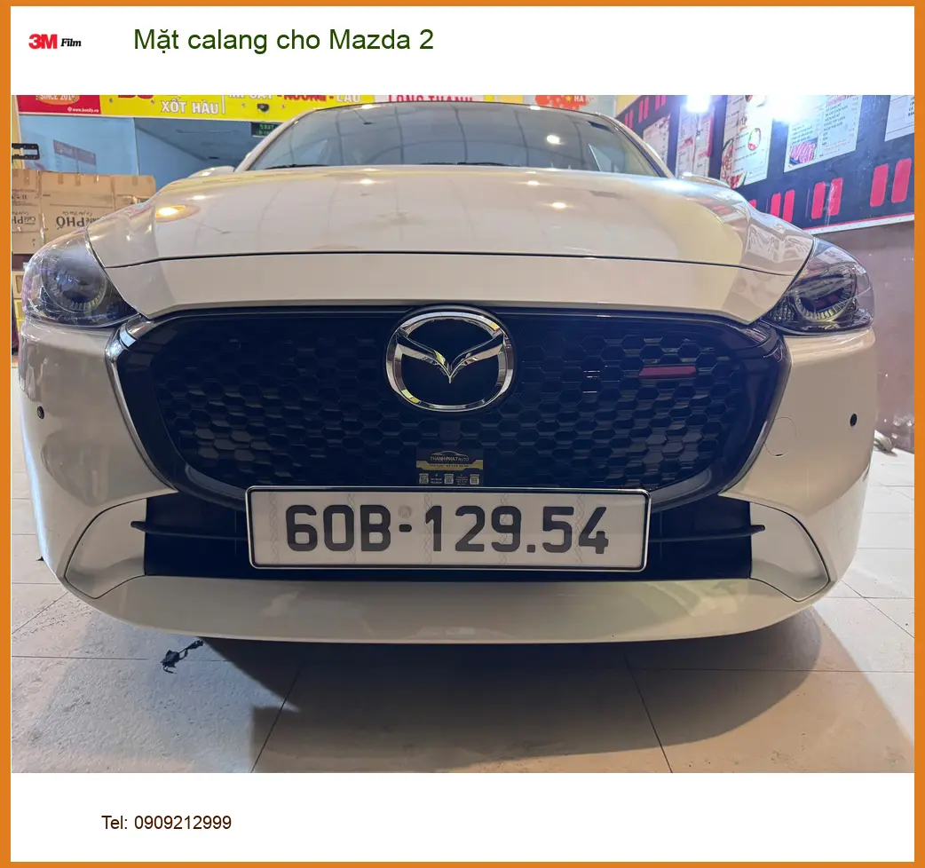 Chị Thảo độ Mặt calang cho Mazda 2 tại Quận 5 để xe thêm phần cá tính và sang trọng ảnh thực tế 3