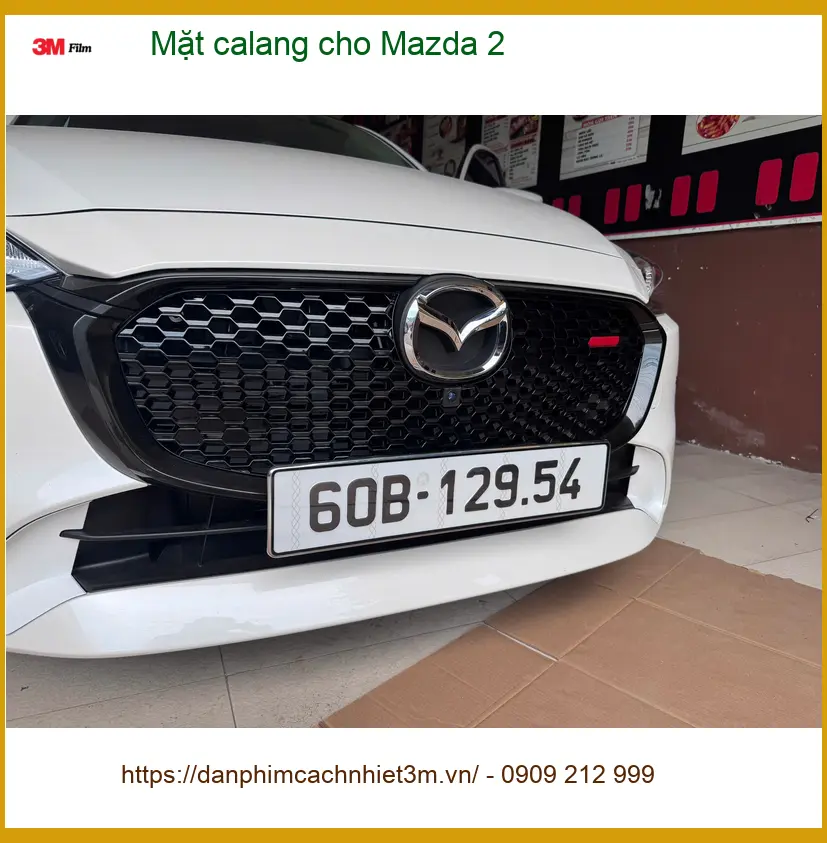 Chị Thảo độ Mặt calang cho Mazda 2 tại Quận 5 để xe thêm phần cá tính và sang trọng ảnh thực tế 5