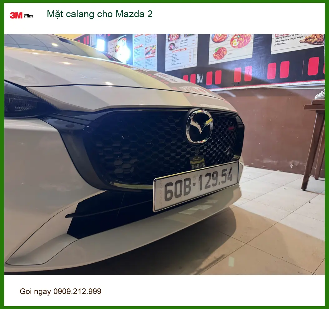 Anh Trọng nâng cấp Mặt calang cho Mazda 2 ở Quận 9 để xe trông thể thao hơn ảnh thực tế 5