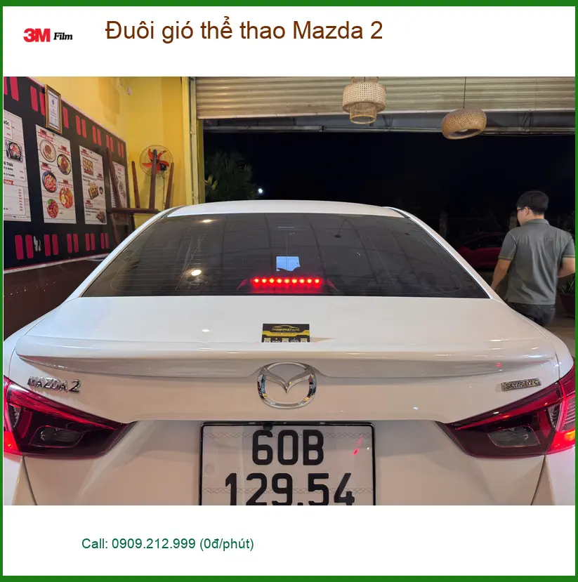 Anh Tấn lắp đuôi gió thể thao Mazda 2 tại Quận Tân Bình để xe trông cá tính hơn