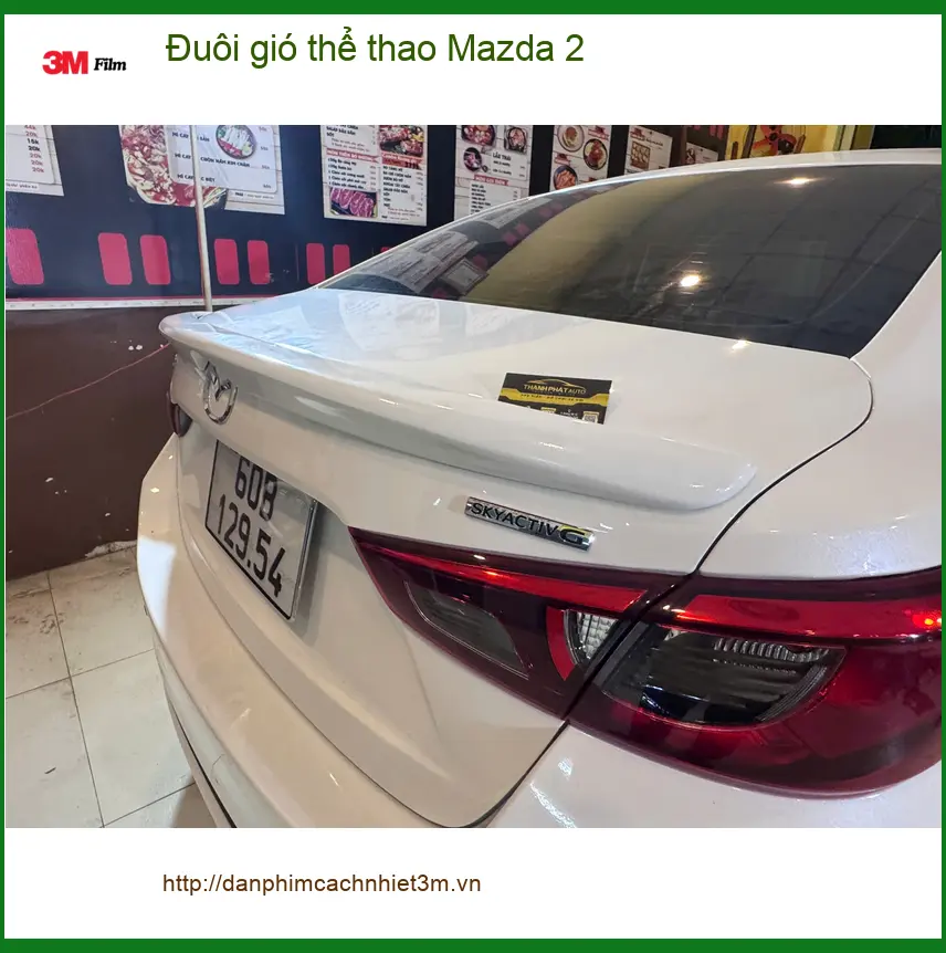 Anh Hùng lắp đuôi gió thể thao Mazda 2 tại Quận 12 để xe cá tính hơn ảnh thực tế 2